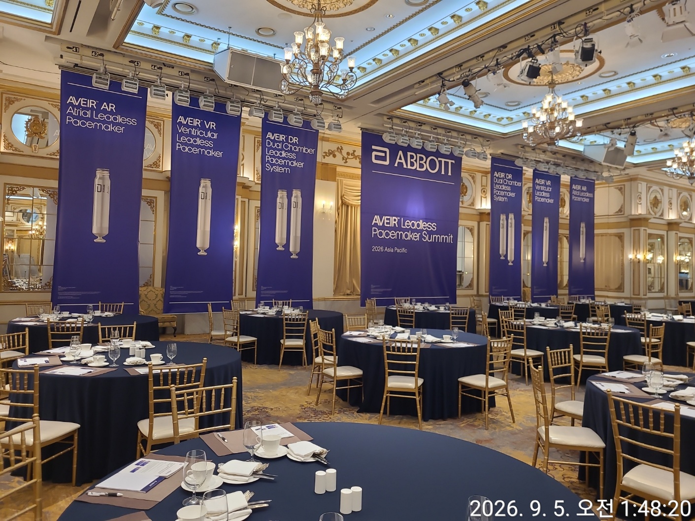 Vertical UV banners along the wall
